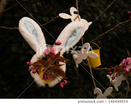 Easter bunny rabbit decorations on blossom tree Easter bunny rabbit decorations on blossom tree 140499954