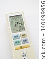 Air conditioner remote control placed on a white background 140499956