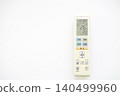 Air conditioner remote control on a white background 140499960