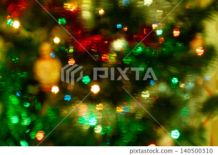 Blured sparks of light on cristmas tree, spruce lights on background Blured sparks of light on cristmas tree, spruce lights on background 140500310