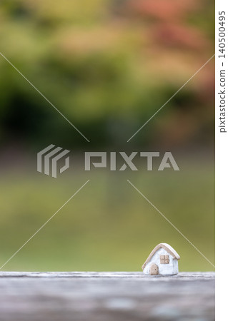 A small, cute ceramic house ornament A small, cute ceramic house ornament 140500495