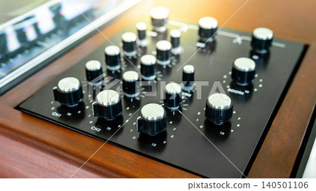 Audio mixer with knob button. Sound mixing console in music recording studio. Audio mixer with knob button. Sound mixing console in music recording studio. 140501106