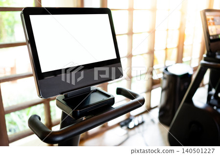 Blank white monitor screen on stationary exercise bike Blank white monitor screen on stationary exercise bike 140501227