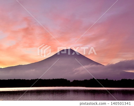 Mount Fuji and the sunrise as seen from Lake Tanuki Mount Fuji and the sunrise as seen from Lake Tanuki 140501341
