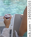 delicious cocktail by the pool 140501503