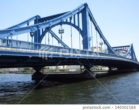 The impressive blue Eitai Bridge spans the Sumida River in Tokyo. The impressive blue Eitai Bridge spans the Sumida River in Tokyo. 140502168