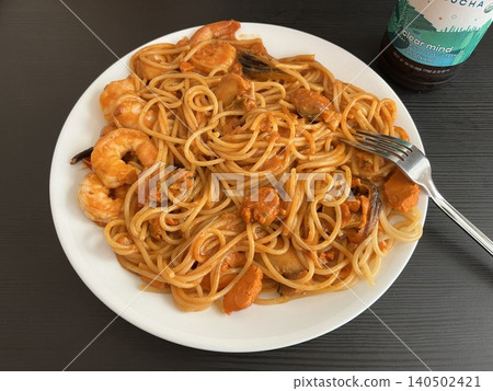 Classic spaghetti coated in rich tomato sauce, offering a simple yet delicious combination of tangy, savory flavors perfect for a comforting meal. Classic spaghetti coated in rich tomato sauce, offering a simple yet delicious combination of tangy, savory flavors perfect for a comforting meal. 140502421