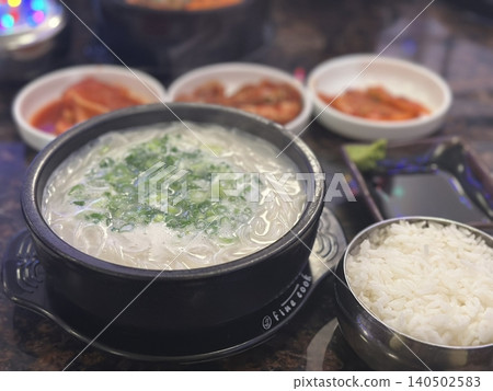 Warm and comforting jibbap (home-cooked Korean meal) with a spread of rice, soup, and banchan, offering a perfect harmony of flavor, tradition, and heartwarming nourishment in every bite. Warm and comforting jibbap (home-cooked Korean meal) with a spread of rice, soup, and banchan, offering a perfect harmony of flavor, tradition, and heartwarming nourishment in every bite. 140502583