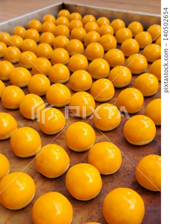 Pineapple cake, called Kue Nenas or Nastar in Indonesian, is one of the most popular traditional sweets to celebrate Eid al-Fitr. Indonesian people's favorite sweets. Selective focus. 140502654