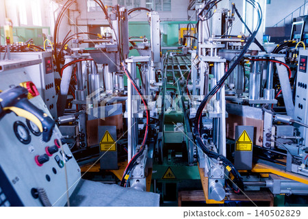 Factory for aluminum and PVC windows and doors production. Details industrial equipment. Factory for aluminum and PVC windows and doors production. Details industrial equipment. 140502829