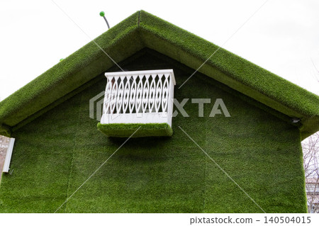 Innovative Green Architecture: A Unique Structure Showcasing Eco-Friendly Design with Artificial Grass and Elegant White Balcony Details Innovative Green Architecture: A Unique Structure Showcasing Eco-Friendly Design with Artificial Grass and Elegant White Balcony Details 140504015