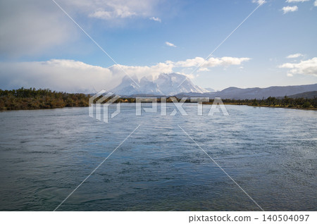 Patagonia mountain lake under blue sky and cloud with calm water Patagonia mountain lake under blue sky and cloud with calm water 140504097