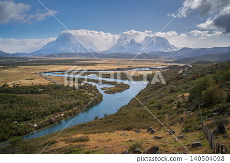 Patagonia mountain river valley under cloudy sky Patagonia mountain river valley under cloudy sky 140504098
