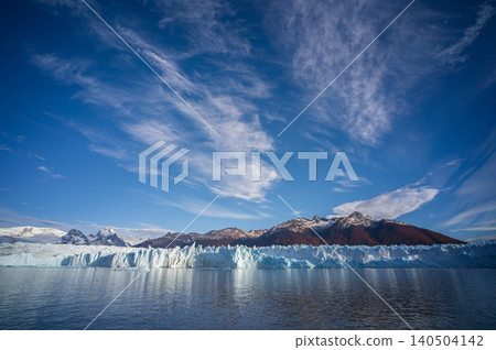 Perito moreno glacier patagonia los glaciares national park, blue ice cliff above lake under dramatic sky Perito moreno glacier patagonia los glaciares national park, blue ice cliff above lake under dramatic sky 140504142