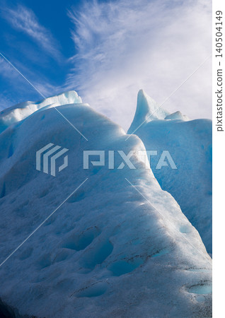 Perito moreno glacier patagonia los glaciares national park icy blue ice ridge under bright sky calm wild landscape Perito moreno glacier patagonia los glaciares national park icy blue ice ridge under bright sky calm wild landscape 140504149