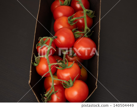 Fresh Organic Ripe Cherry Tomatoes in a Cardboard Box, Healthy Vegetable Produce, Garden Harvest, Natural Food Fresh Organic Ripe Cherry Tomatoes in a Cardboard Box, Healthy Vegetable Produce, Garden Harvest, Natural Food 140504449