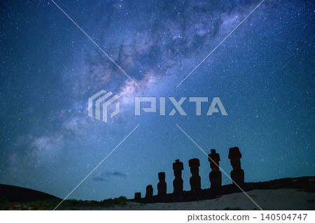 Peaceful moai statue on easter island chile beneath majestic night sky full of star Peaceful moai statue on easter island chile beneath majestic night sky full of star 140504747