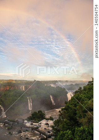 Peaceful iguazu falls natural landscape under colorful rainbow Peaceful iguazu falls natural landscape under colorful rainbow 140504754
