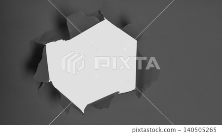 Creative Design Featuring a Torn Paper Hole Against a Solid Grey Background for Artistic Projects 140505265