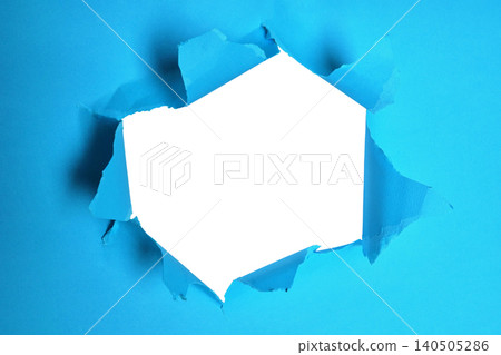 Torn Blue Paper Background with a Hole Featuring Blank White Space for Text or Images Torn Blue Paper Background with a Hole Featuring Blank White Space for Text or Images 140505286