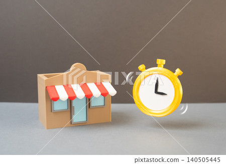 A store and a stopwatch representing business deadlines and commercial opportunities. Leasing a plot of land or premises, franchise development and market expansion. 140505445