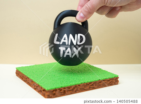The land tax weight is placed on a plot of land. Property valuation and taxation shape investment decisions. Real estate finance and local policy influence ownership costs and land profitability. 140505488