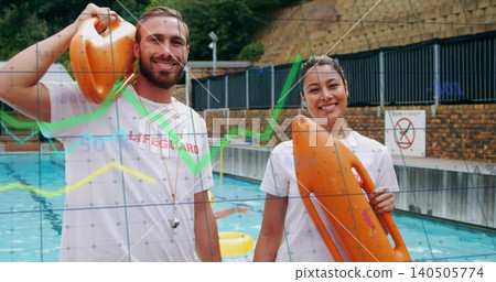 Standing lifeguards in white LIFEGUARD shirts holding orange buoys at pool with whistle yellow ring Standing lifeguards in white LIFEGUARD shirts holding orange buoys at pool with whistle yellow ring 140505774