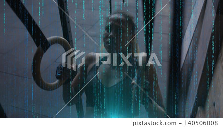 Holding fit woman gripping wooden ring in shaft, wearing dark sports bra, straps and cyan light Holding fit woman gripping wooden ring in shaft, wearing dark sports bra, straps and cyan light 140506008