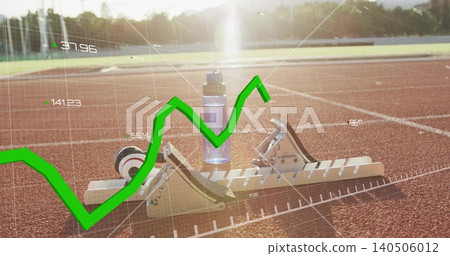 Showing starting blocks with water bottle resting on red athletics track, green graph overlay Showing starting blocks with water bottle resting on red athletics track, green graph overlay 140506012