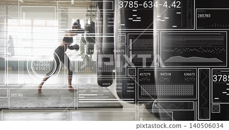 Punching adult woman training on heavy punching bag in fitness studio, sports bra and shorts, HUD Punching adult woman training on heavy punching bag in fitness studio, sports bra and shorts, HUD 140506034
