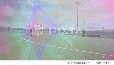 Swinging hockey player wearing jersey and shorts on turf, with goalkeeper pads, stick, copy space Swinging hockey player wearing jersey and shorts on turf, with goalkeeper pads, stick, copy space 140506150