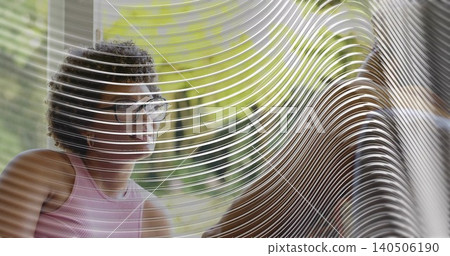 Sitting woman in pink tank top at cafe facing right through ribbed glass, eyeglasses, copy space Sitting woman in pink tank top at cafe facing right through ribbed glass, eyeglasses, copy space 140506190