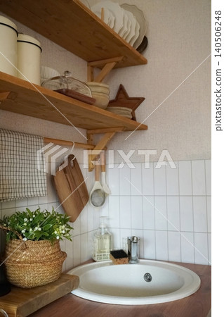 Cozy Kitchen Decor with Rustic Shelves, Dishware, and Elegant Baskets for a Homely Atmosphere Cozy Kitchen Decor with Rustic Shelves, Dishware, and Elegant Baskets for a Homely Atmosphere 140506248