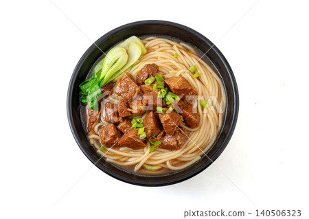Traditional Chinese Braised Beef Rice Noodles with Bok Choy and Scallions. Authentic Asian Beef Noodle Soup in black Bowl. Traditional Chinese Braised Beef Rice Noodles with Bok Choy and Scallions. Authentic Asian Beef Noodle Soup in black Bowl. 140506323