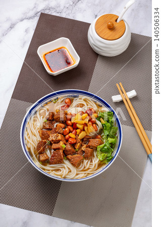 Chinese Braised Beef Noodle Soup with Green Vegetables. Traditional Asian Beef Ramen, Oriental Comfort Food Chinese Braised Beef Noodle Soup with Green Vegetables. Traditional Asian Beef Ramen, Oriental Comfort Food 140506334