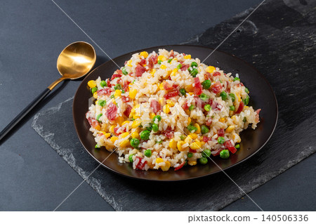 Fusion Fried Rice with Chinese Sausage, Corn, Green Peas and Melted Cheese. Creative Asian Stir-Fried Rice Bowl. 140506336