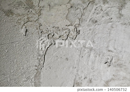 Texture of Old Wall with Cracked Plaster and Peeling Paint Demonstrating Weathered Appearance Texture of Old Wall with Cracked Plaster and Peeling Paint Demonstrating Weathered Appearance 140506732