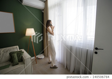 Attractive woman using smartphone indoor Attractive woman using smartphone indoor 140506784