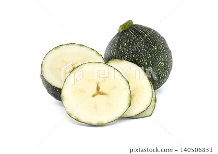 Round zucchini sliced and whole, showcasing fresh green vegetable texture 140506831