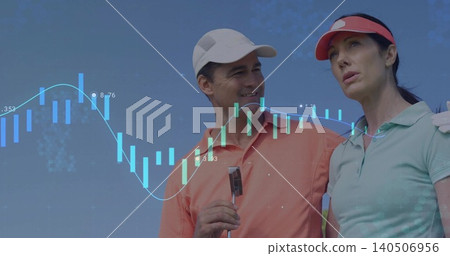 Smiling two golfers on golf course wearing polos and visor, holding putter with financial chart Smiling two golfers on golf course wearing polos and visor, holding putter with financial chart 140506956