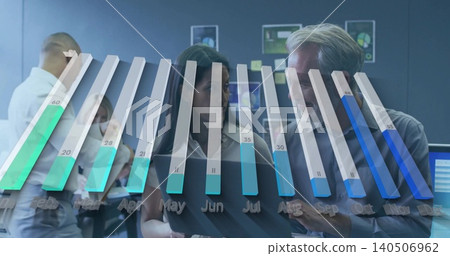 Examining midlife woman and man in suits reviewing tablet at office, 3D bar chart, monitors Examining midlife woman and man in suits reviewing tablet at office, 3D bar chart, monitors 140506962