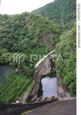 The waterway and rocky area of the Hyugami Valley, viewed from above the dam. The waterway and rocky area of the Hyugami Valley, viewed from above the dam. 140507918