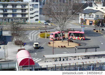 A community bus with a strawberry pattern running in the rotary in front of Mooka Station, Mooka City, Tochigi Prefecture. A community bus with a strawberry pattern running in the rotary in front of Mooka Station, Mooka City, Tochigi Prefecture. 140508417