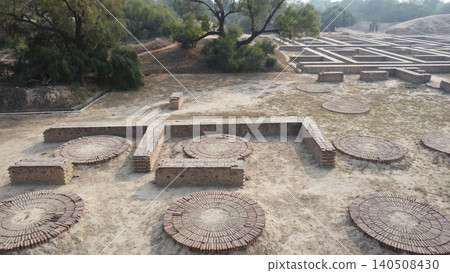 Harappa aerial view of old home quarters and round work platforms where people cleaned grain and made blue dye Harappa aerial view of old home quarters and round work platforms where people cleaned grain and made blue dye 140508430