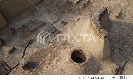 Harappa archaeological excavation site with ancient well and brick drainage system in Pakistan Harappa archaeological excavation site with ancient well and brick drainage system in Pakistan 140508434