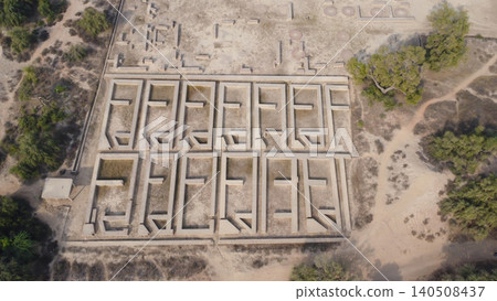 Harappa archaeological site showing ancient craft floors and house foundations in aerial view pakistan Harappa archaeological site showing ancient craft floors and house foundations in aerial view pakistan 140508437