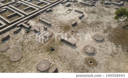 Harappa home ruins with circular dye and grain platforms aerial view Harappa home ruins with circular dye and grain platforms aerial view 140508443