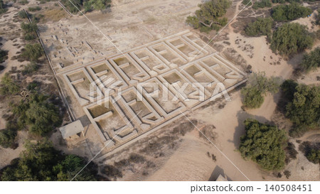 Harappa ruins in pakistan with circular grain platforms and residential brick rooms viewed from above Harappa ruins in pakistan with circular grain platforms and residential brick rooms viewed from above 140508451