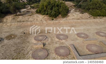 ancient circular drying platform of harappa civilization where blue dyed fabric rested and wheat husks were removed ancient circular drying platform of harappa civilization where blue dyed fabric rested and wheat husks were removed 140508460