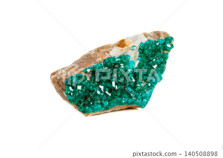Macro mineral stone Dioptase silicate copper on a white background Macro mineral stone Dioptase silicate copper on a white background 140508898